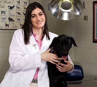 Dr. Kathryn Rook with a dog